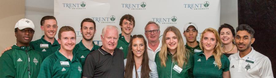 A group shot of various Excalibur student-athletes among donors and long time supporters of Trent Athletics. 